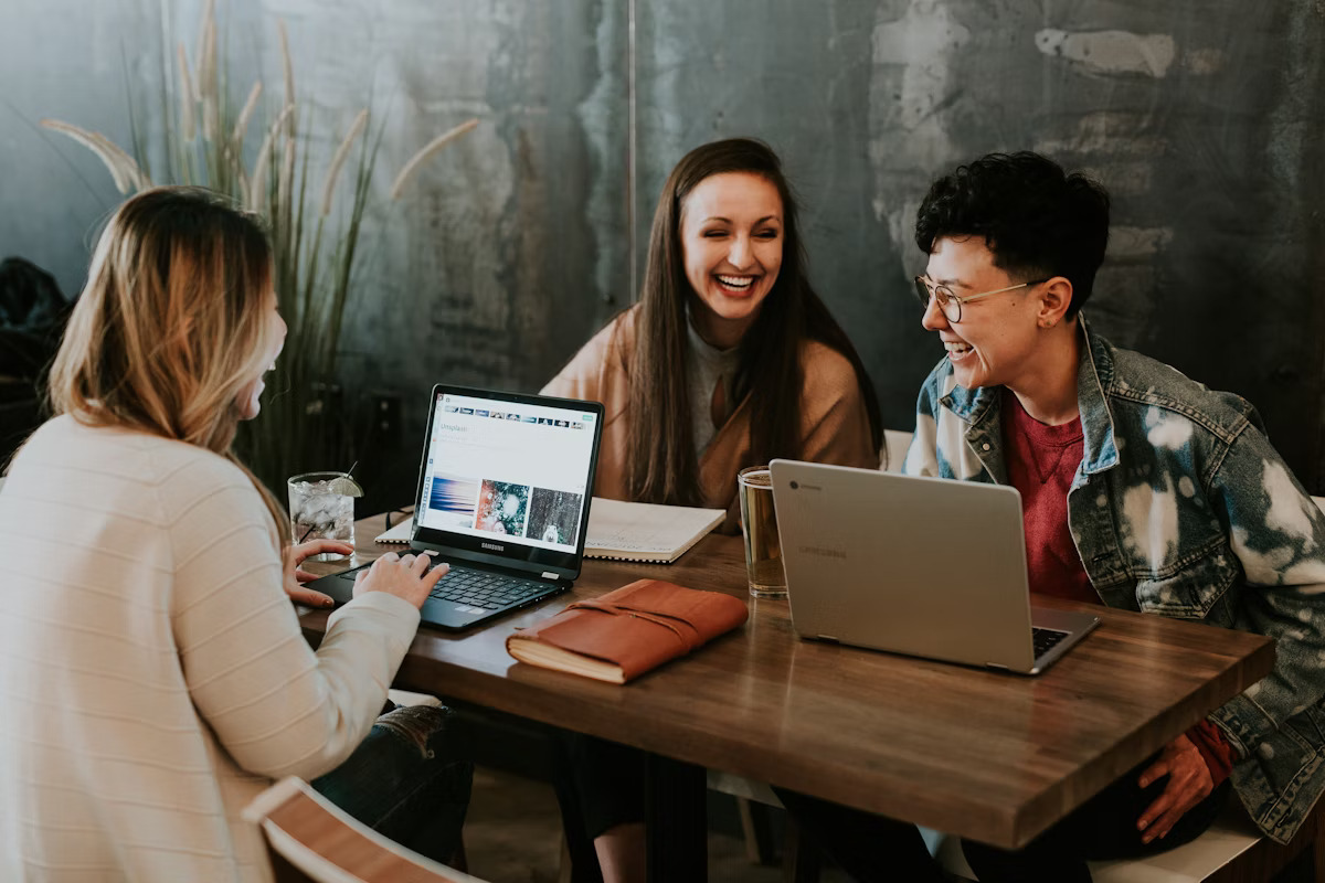 Razen team collaborating with founders in a modern office